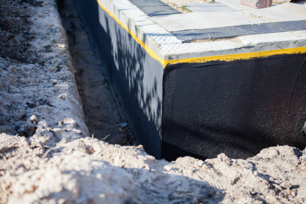 Professional Emergency Waterproofing technician working in Centereach, NY